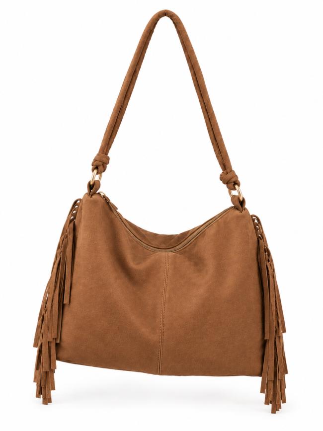 Brown fringe tote bag with long shoulder strap and side tassels, made of suede-like material.