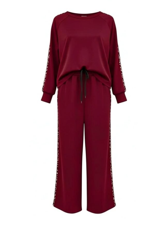 Σετ Μπορντό με Λεοπάρ Maroon jumpsuit with long sleeves, drawstring at the waist, and white braided trim along the sleeves.