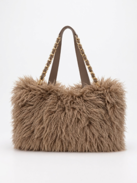 Brown fluffy handbag with gold chain straps on a light background.