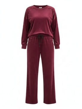 Burgundy velour tracksuit with studded shoulders, a long-sleeve top and matching drawstring pants.