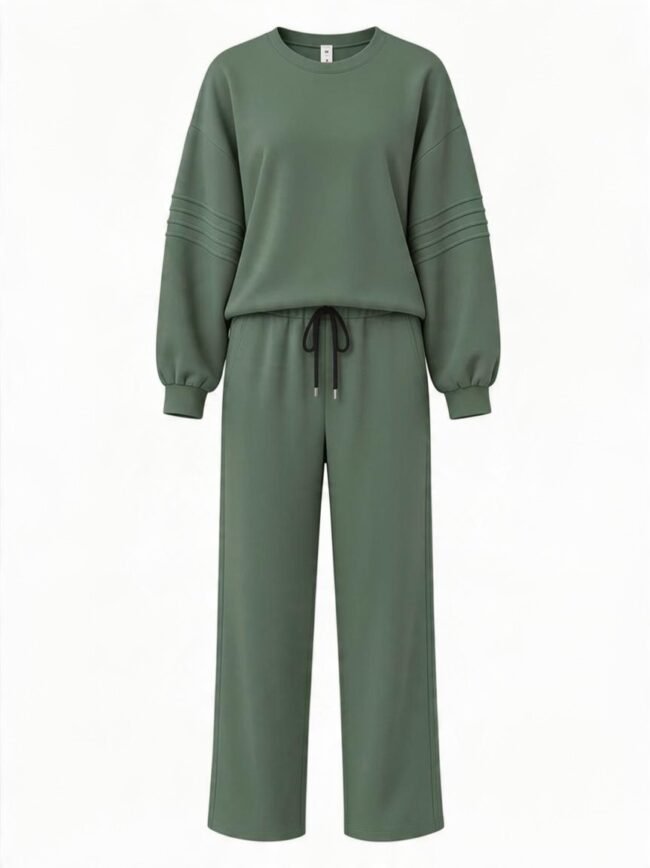 Olive-green matching tracksuit: oversized sweatshirt with quilted sleeve panels and drawstring wide-leg pants.