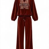 Wine-red velvet loungewear set: cropped-sleeve top and wide-leg pants with a drawstring waist and a leopard-print M logo on the chest.