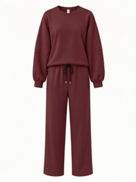 Maroon loungewear set with a loose sweatshirt and wide-leg drawstring pants.