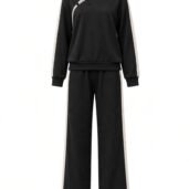 Black matching tracksuit: long-sleeve top with white piping and Chinese knot buttons, paired with wide-leg pants with white side stripes.
